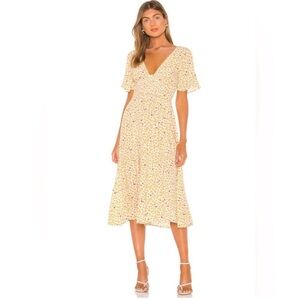 Free People v-neck midi with yellow floral pattern size medium